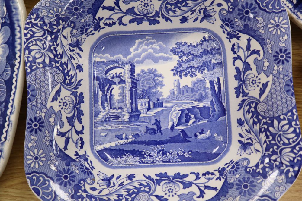 A collection of 19th / 20th century blue and white pottery including meat platters, dishes, bowls, etc.